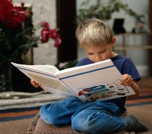 Boy reading book